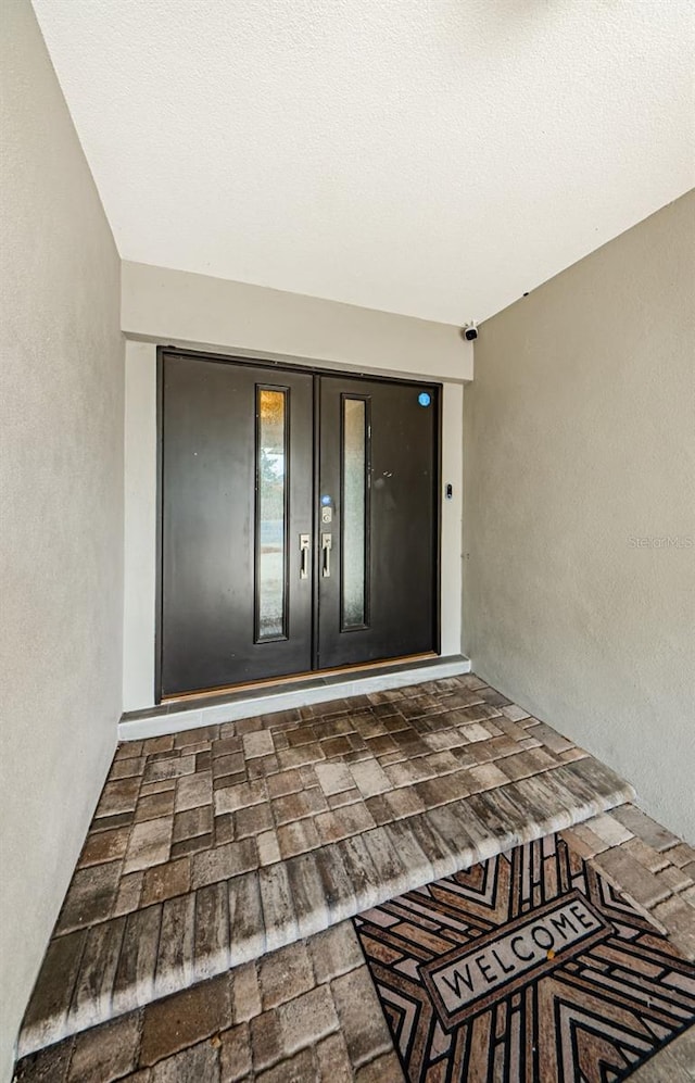 entrance to property with french doors