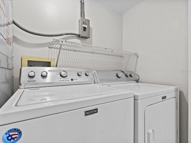 laundry area featuring laundry area and separate washer and dryer