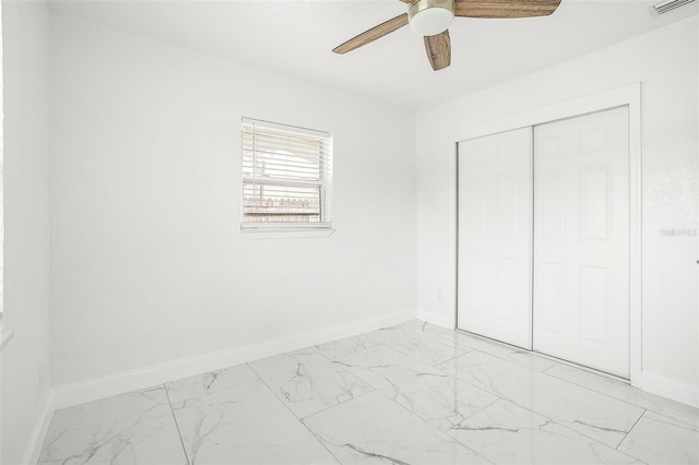 unfurnished bedroom with a closet and ceiling fan