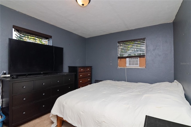 bedroom with light colored carpet