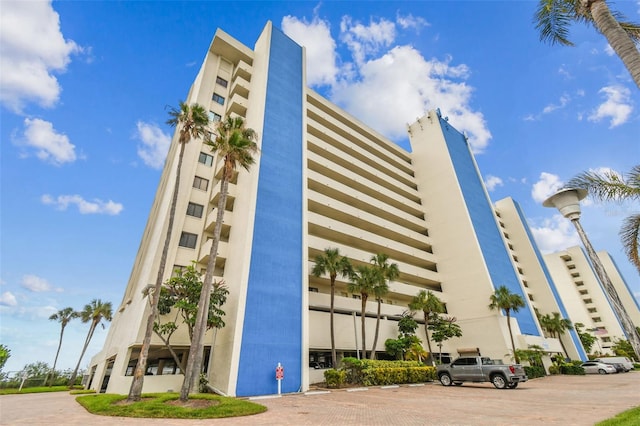 14950 Gulf Blvd Unit 404, Madeira Beach, FL 33708 - view of property featuring uncovered parking