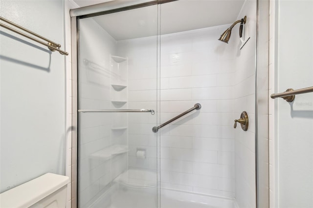 14950 Gulf Blvd Unit 404, Madeira Beach, FL 33708 - bathroom with toilet and a shower stall