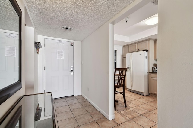 14950 Gulf Blvd Unit 404, Madeira Beach, FL 33708 - entryway with light tile patterned floors and baseboards