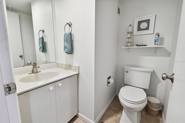 14950 Gulf Blvd Unit 404, Madeira Beach, FL 33708 - half bathroom with toilet, vanity, and tile patterned flooring