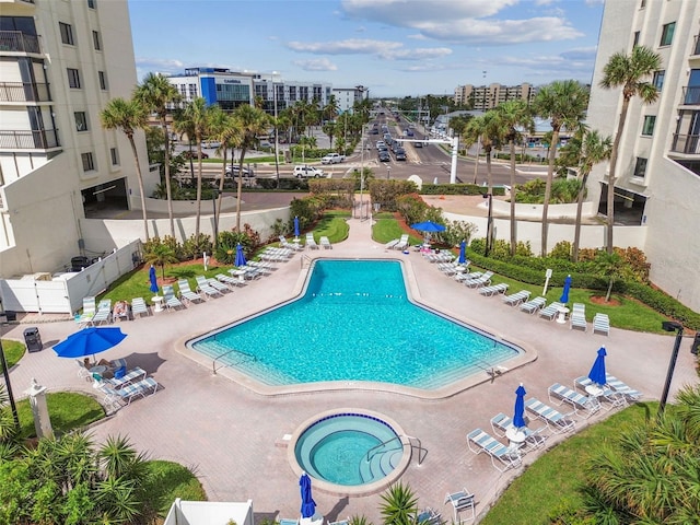 14950 Gulf Blvd Unit 404, Madeira Beach, FL 33708 - community pool featuring a patio area