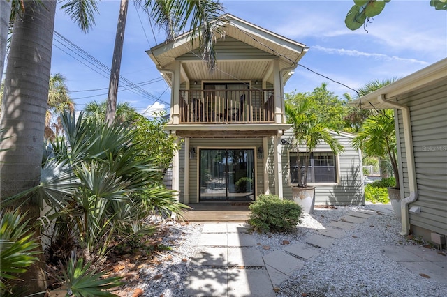 doorway to property featuring a balcony