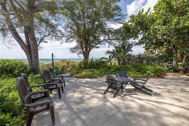 view of patio / terrace featuring a water view