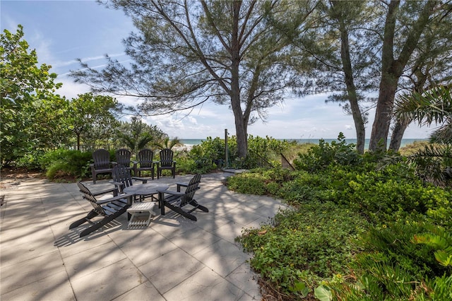 view of patio / terrace with a water view