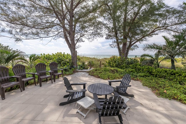 view of patio / terrace with a water view