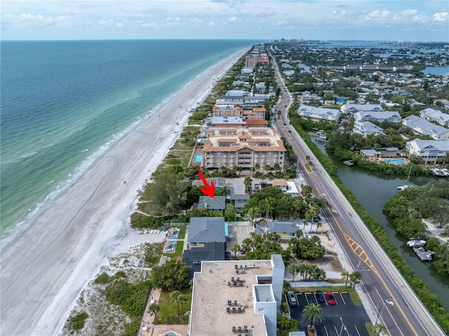 drone / aerial view with a view of the beach and a water view