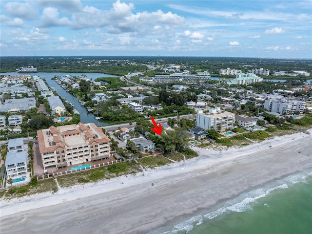 aerial view featuring a water view and a view of the beach