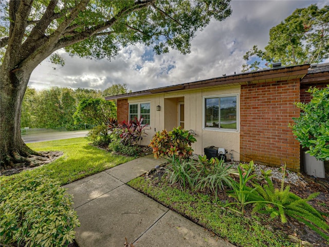 view of front of home with a front yard