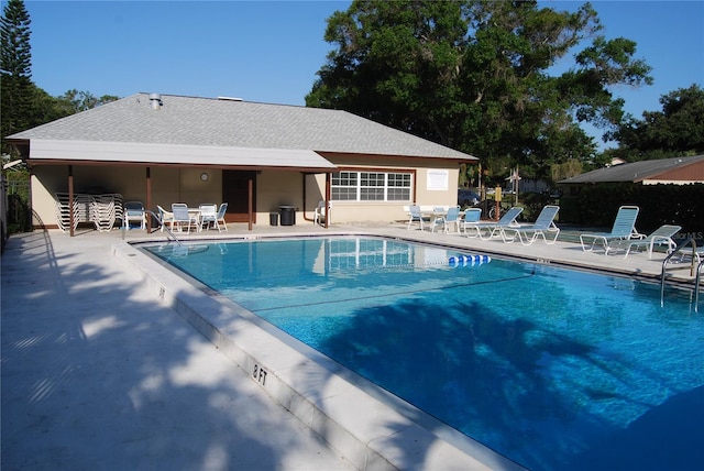 view of pool featuring a patio area