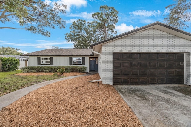 ranch-style house featuring a garage