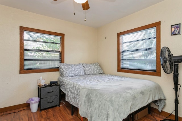 bedroom featuring ceiling fan and hardwood / wood-style floors