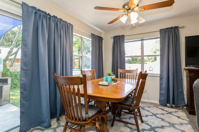 dining area with ceiling fan