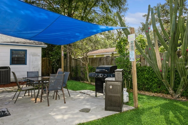 view of patio / terrace featuring a grill and central air condition unit