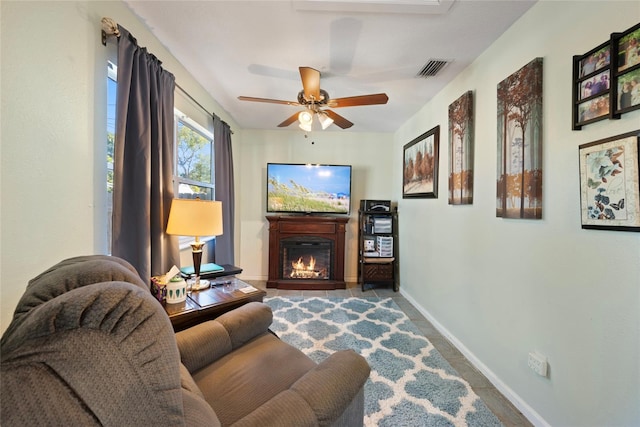 living room featuring ceiling fan