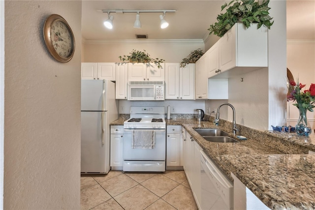 kitchen featuring white appliances, ornamental molding, white cabinetry, and sink