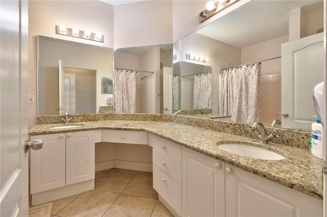 bathroom featuring vanity, a shower with curtain, and tile patterned flooring