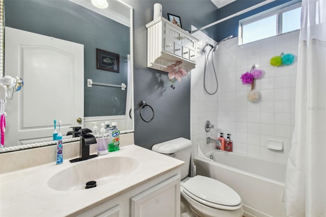 bathroom featuring toilet, shower / bathtub combination with curtain, and vanity