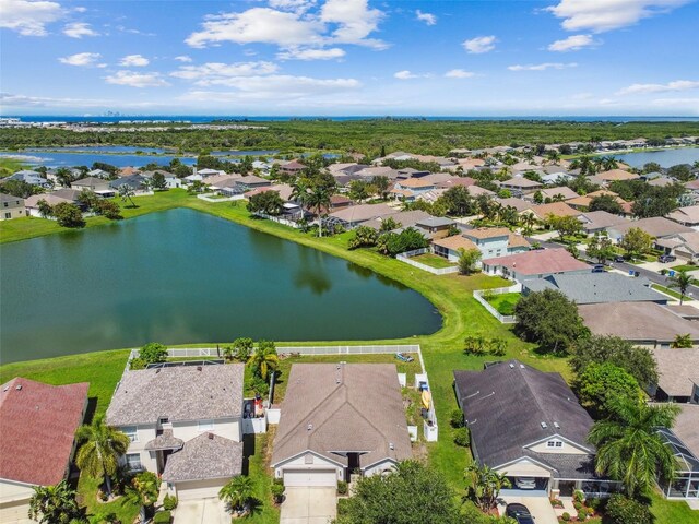 aerial view featuring a residential view and a water view