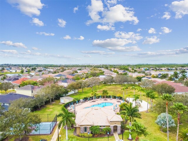 birds eye view of property with a residential view