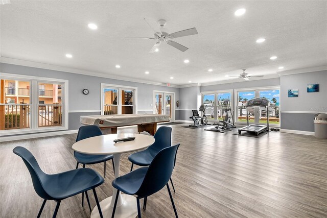 dining area featuring crown molding, ceiling fan, pool table, and wood-type flooring