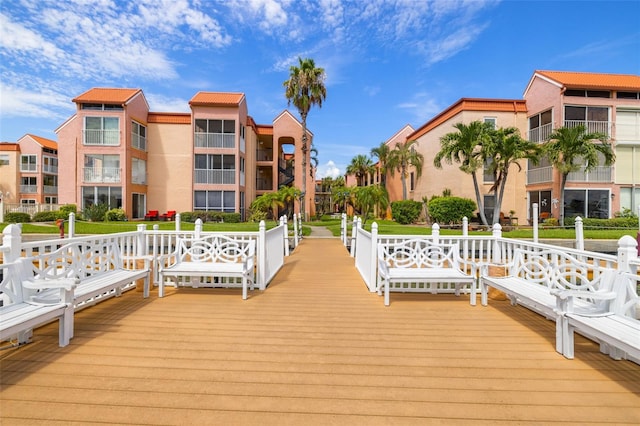 view of dock with a balcony