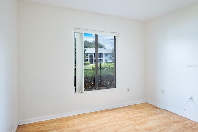 unfurnished room featuring light hardwood / wood-style floors