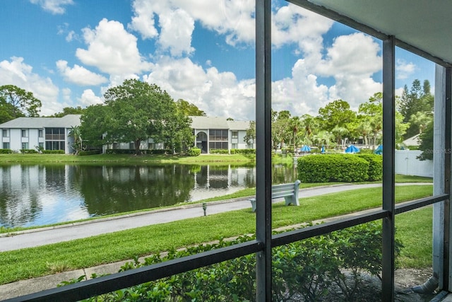 exterior space with a water view