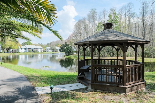 dock area featuring a gazebo and a water view