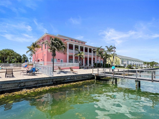 dock area with a water view