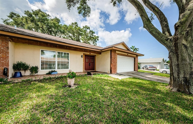 2208 Citrus Valley Cir, Palm Harbor, FL 34683 - ranch-style home with a garage, concrete driveway, a front yard, brick siding, and stucco siding
