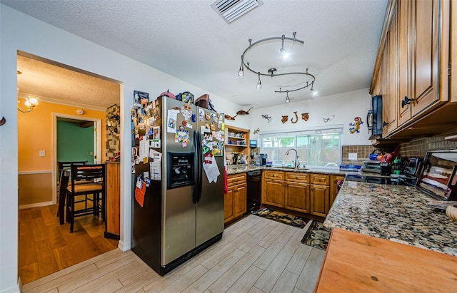 2208 Citrus Valley Cir, Palm Harbor, FL 34683 - kitchen featuring black dishwasher, stainless steel fridge with ice dispenser, light wood-type flooring, and a sink