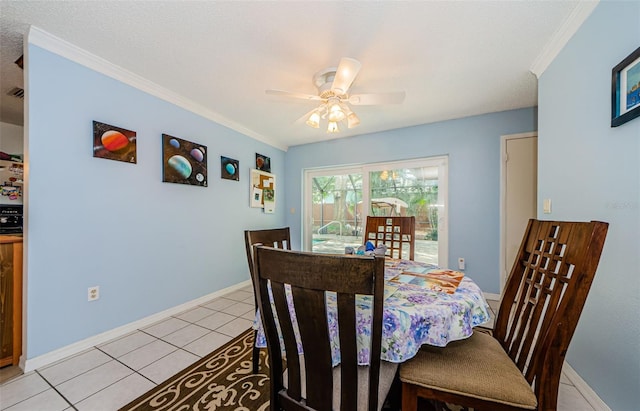 2208 Citrus Valley Cir, Palm Harbor, FL 34683 - dining space with baseboards, ceiling fan, ornamental molding, and light tile patterned floors
