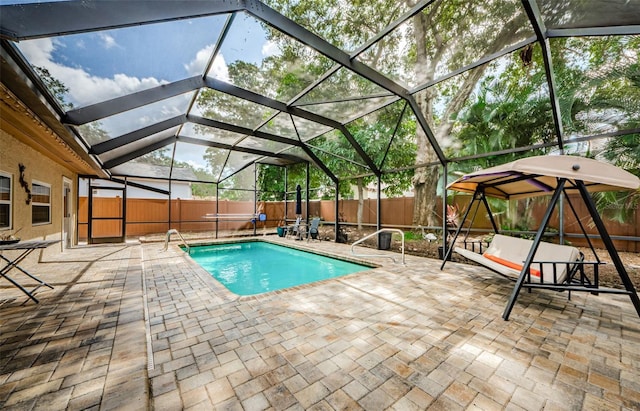 2208 Citrus Valley Cir, Palm Harbor, FL 34683 - view of pool with a fenced backyard, a fenced in pool, glass enclosure, and a patio area