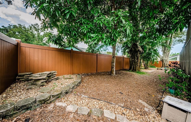 2208 Citrus Valley Cir, Palm Harbor, FL 34683 - view of yard with a fenced backyard