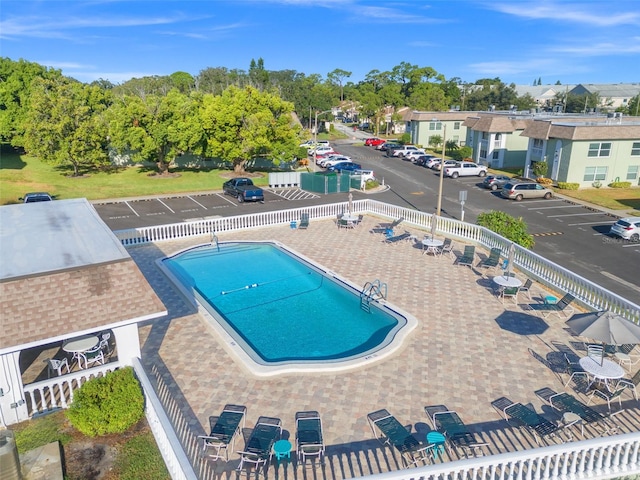 view of swimming pool with a patio area