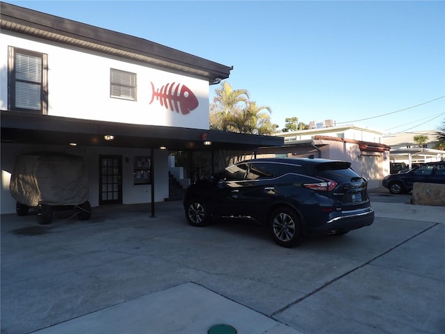 view of front of property with a carport