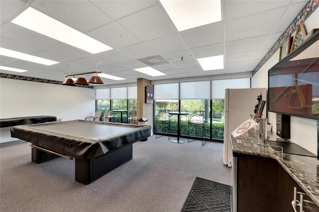 rec room with a paneled ceiling, pool table, and carpet floors