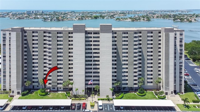 view of building exterior with a water view