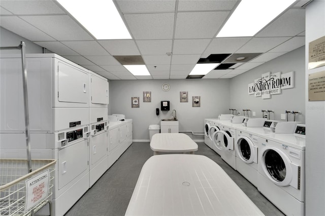 washroom with separate washer and dryer and stacked washer / dryer