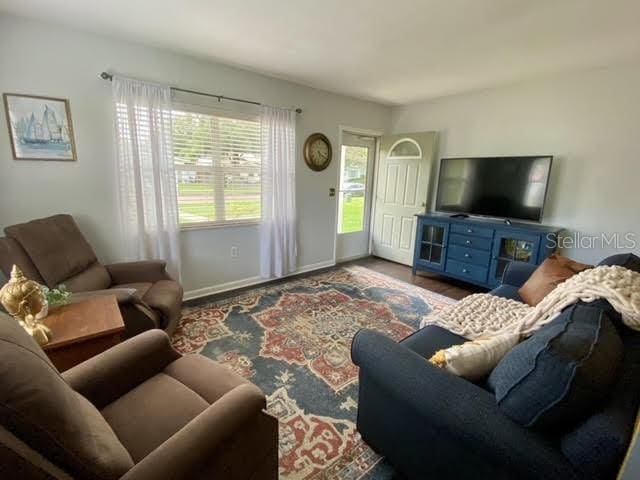 living room with hardwood / wood-style flooring