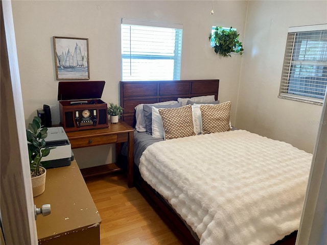 bedroom featuring light wood-type flooring