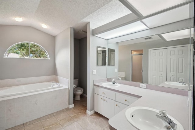 full bathroom with toilet, a textured ceiling, vaulted ceiling, independent shower and bath, and vanity