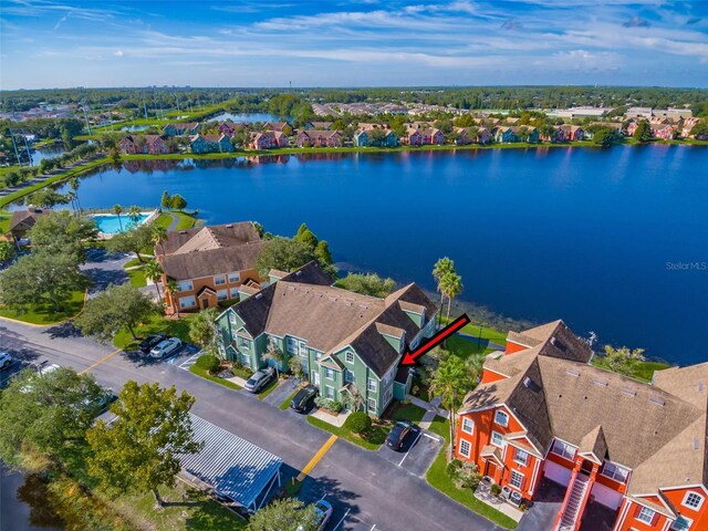 bird's eye view with a water view