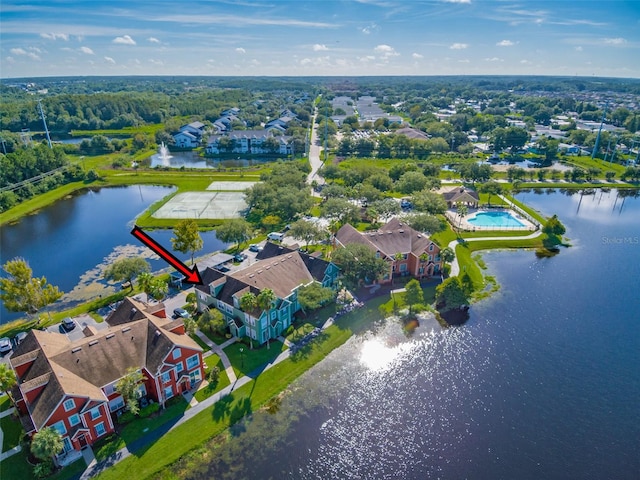 birds eye view of property featuring a water view