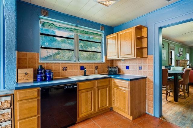 kitchen with dishwasher, light tile patterned flooring, and a healthy amount of sunlight