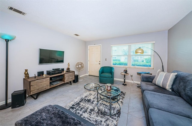 living room with a textured ceiling